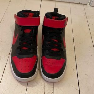 Red and black boys Nike high tops.